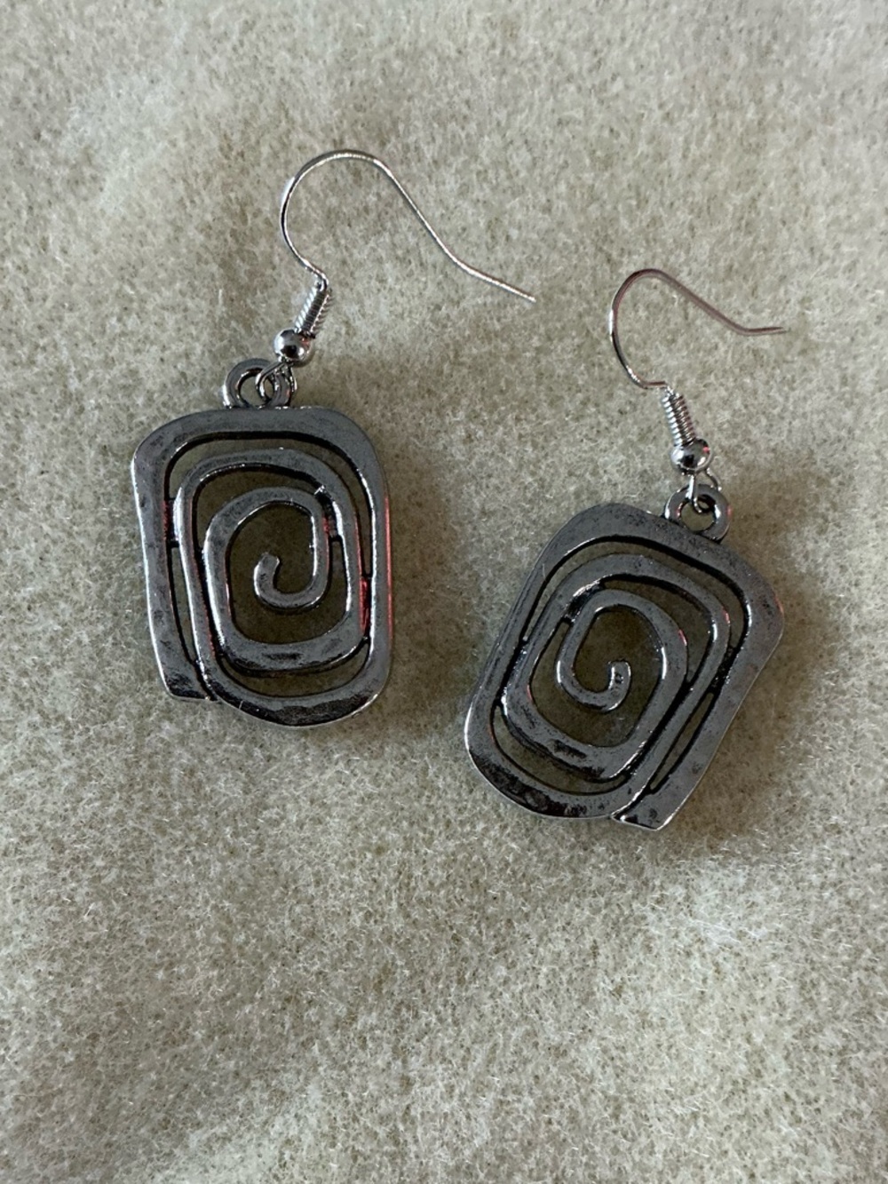 Silver Spiral Drop Earrings with Olive Accent